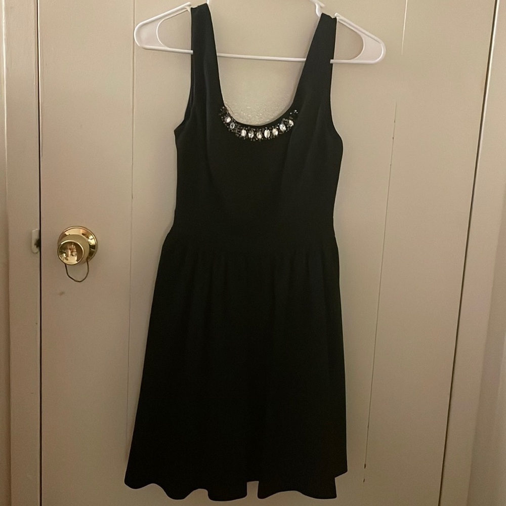 Black princess vera wang dress. Beading on the front, zipper with mesh back.